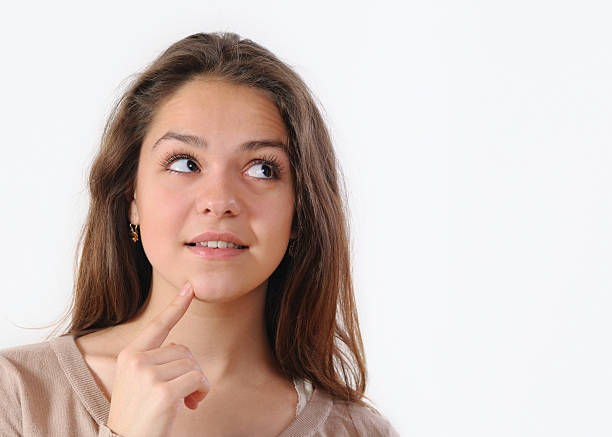 istock beautiful young woman looking away with copyspace 507499298
