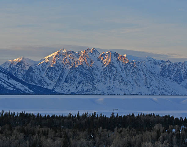 istock Mount Saint John peak sunlit among Grand Tetons Mountain Range 507501018