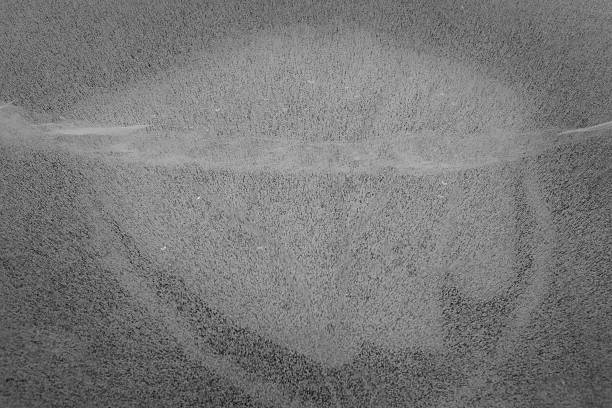 istock The plenty white bubbles of air inside the black ice 507510626