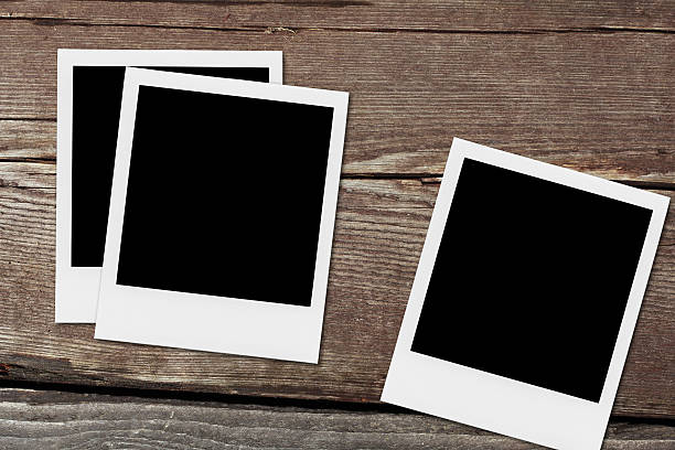 istock Blank Photo Frames On The Wood. 507517347