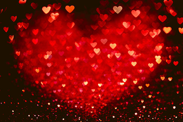 istock Red heart bokeh background. Valentines day texture. 507517418