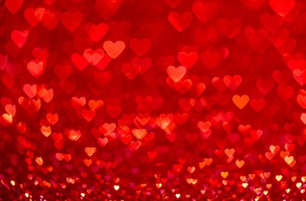 istock Red heart bokeh background. Valentines day texture. 507518058