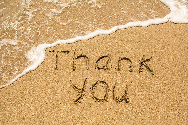 istock Thank you - Inscription on sand beach 507518628