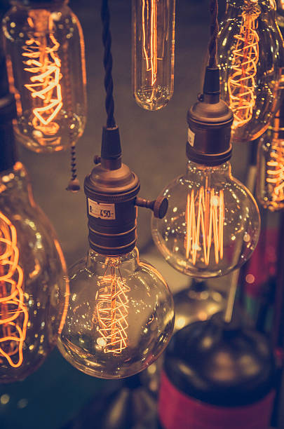 istock luxury edison light bulb in coffee shop 507526364