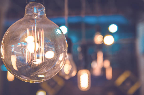 istock luxury edison light bulb in coffee shop 507526458