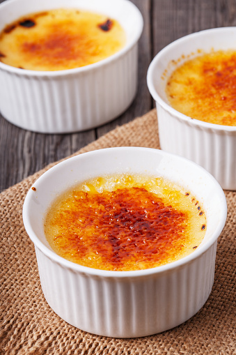 Creme brulee - traditional french vanilla cream dessert with caramelised sugar on top.