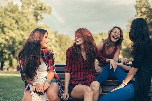 Girls talking and laughing outside