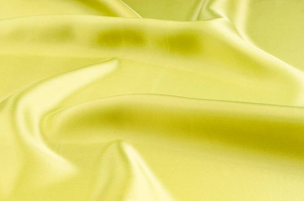 istock green silk fabric texture, salad coloring 507531724