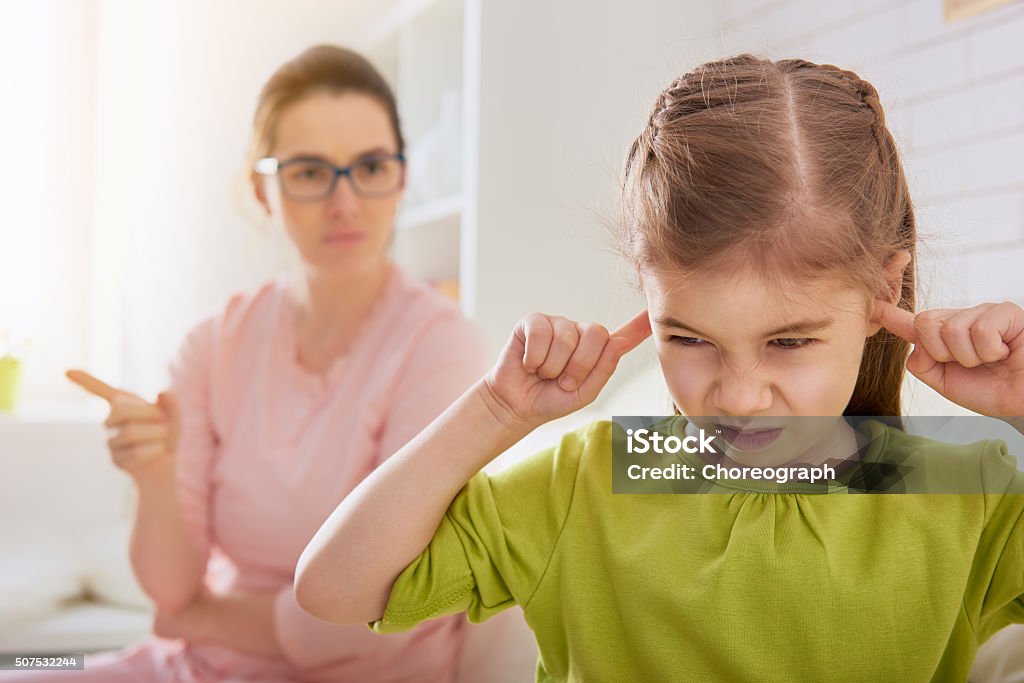 mother scolds her child the education of the child. mother scolds her child girl. family relationships Child Stock Photo