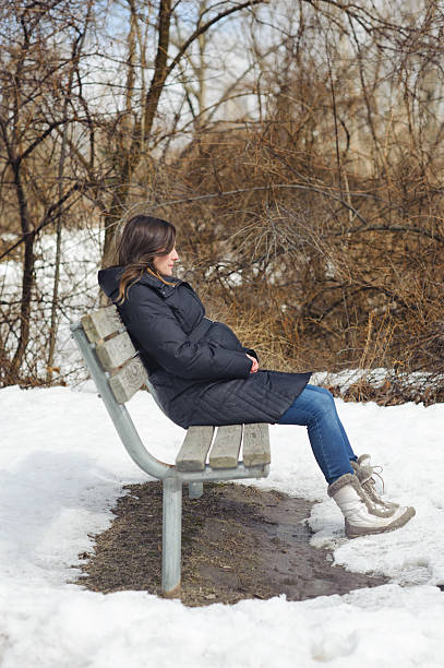 istock Newly Expecting Mother During Winter 507541393