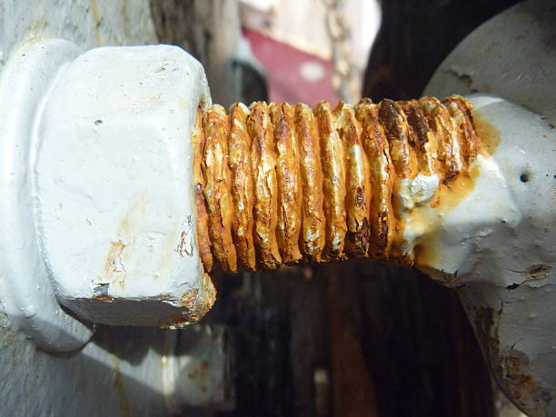 istock Rusty nut and bolt on a piece of marine machinery 507543417
