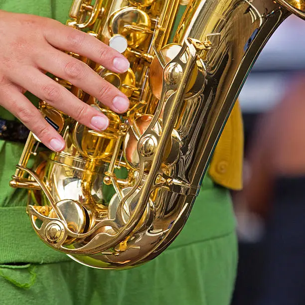 Hand of a saxophonist at play