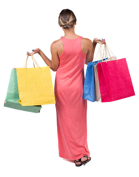vista posteriore della donna in abito corso - domestic cat bag shopping gift foto e immagini stock
