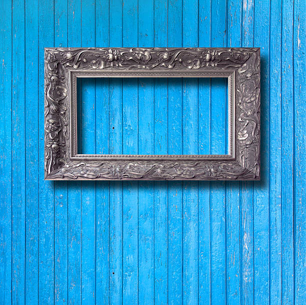 istock Vintage frame for picture on blue wooden wall 507546205