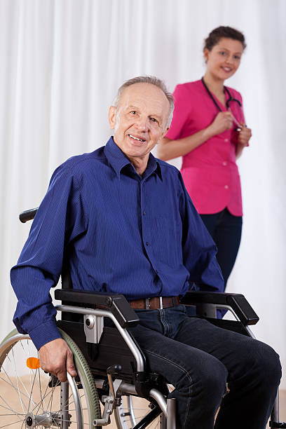 istock Disabled man and nurse in the background 507546361