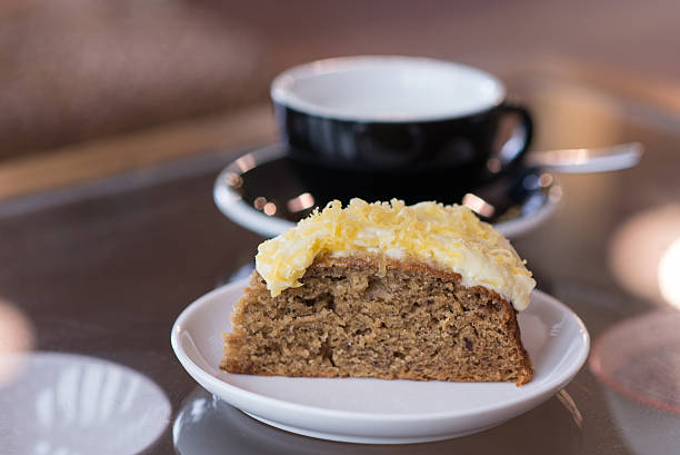 istock banana cake with blurry hot milk in black cup 507552568