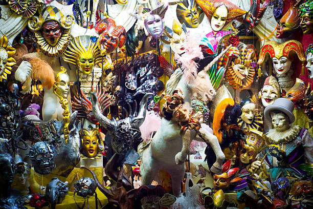 Venice, Italy - April 11, 2015: Candid wide angle  image of masks in a shop in Venice with prices visible.