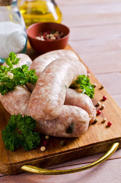 istock Raw sausage with spices 507569776