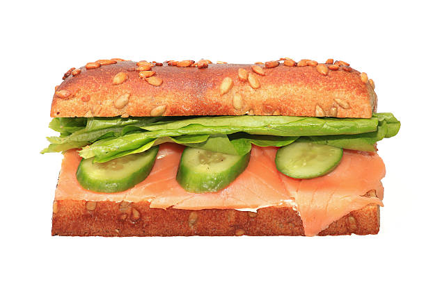 istock Healthy sandwich with salmon,lettuce and sliced cucumbers 507569858