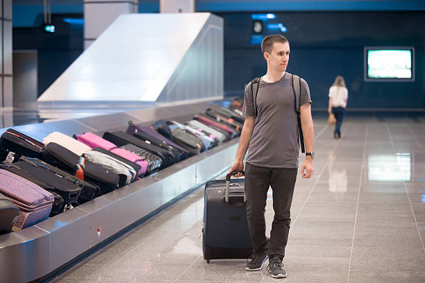 istock Young man at conveyor belt 507570304