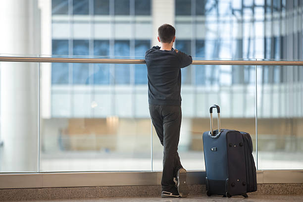 istock Young traveler waiting for airplane 507570624