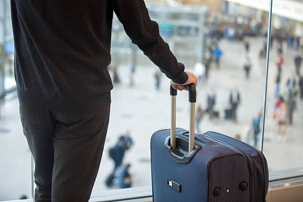 istock Man with luggage 507570684