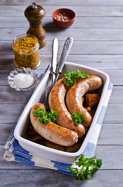 istock Grilled sausages with potatoes 507570880