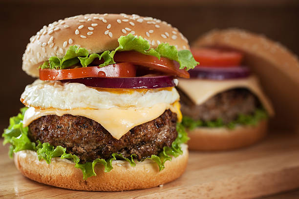 istock hamburger with pork grilled,egg fried and vegetable 507571612