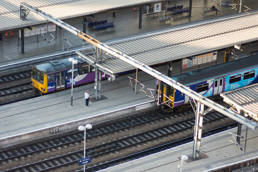 Leeds, England - June 28, 2015: Old Class 144 Pacer and Class 150 Sprinter diesel multiple unit trains at Leeds railway station in West Yorkshire. The new train operating company holding the Northern Rail franchise is required to replace the unpopular Pacer trains with new build diesel trains by 2020.
