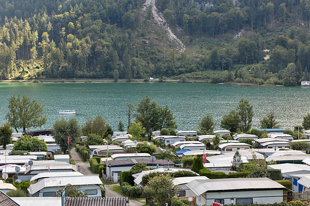 istock Camping on lake shore in Austrian Alps 507575030