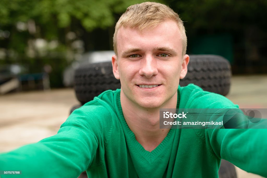 Scandinavian man outdoors taking selfie Blond Hair Stock Photo