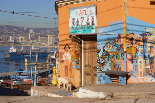 Valparaiso, Сhile - June 17, 2014: Colourful murals decorating a cafe overlooking the harbour in the UNESCO world heritage city of Valparaiso in Chile. Valparaiso is renowned for the number and quality of the murals decorating streets and buildings around the city.