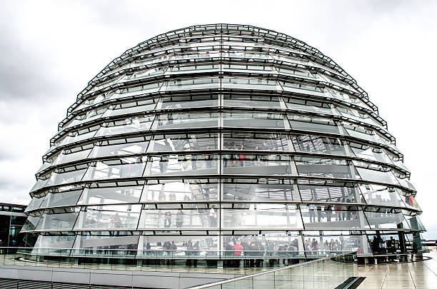 Berlin Reichstag Dome at Twilight. Spiral stairways to the top of the Reichstag, Germany's parliament building in the heart of Berlin, Central Berlin, Germany.