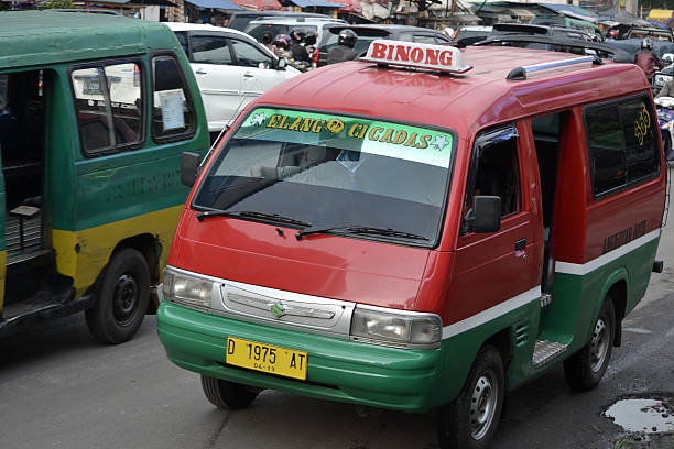 bandung, indonesia-june 13, 2014: public transportation in bandung city called angkot.