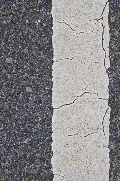 istock asphalt road with marking lines and tire tracks 507577219
