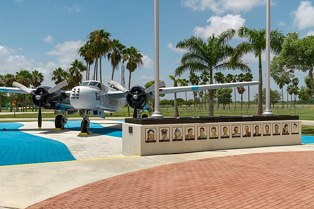 Bay of Pigs Miami, Florida, USA - August 10, 2013 : Monument in Memory of the Pilots of The Liberation Airforce Brigade 2506. Wings Over Miami Museum. Members of the 2506 Brigade who perished during the Invasion of the Bay of Pig and Fighter Bomber, replica of the aircraft used  bay of pigs invasion stock pictures, royalty-free photos & images