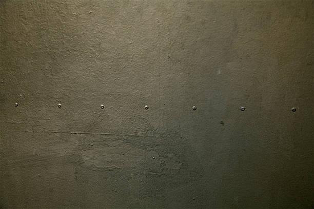 rebites cinza ferro e metal fundo com padrão de alumínio aço parede de concreto - rivet metal textured steel - fotografias e filmes do acervo