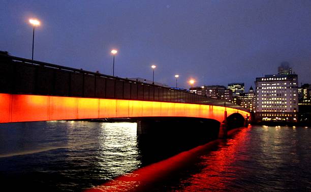 istock London Bridge lit up at night 507578986