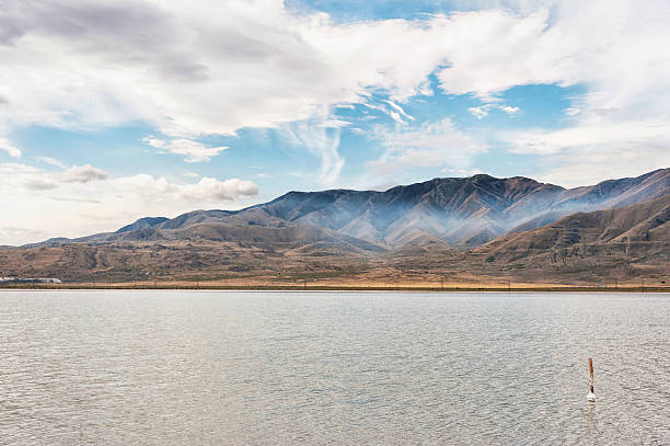 This view looking across the Great Salt Lake shows very interesting mountains under a cloudy sky