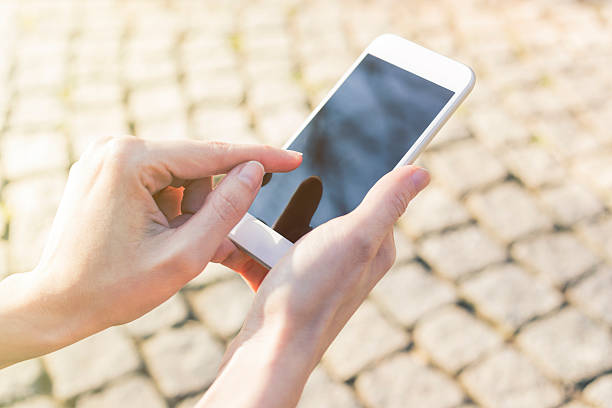 istock Woman Using her Mobile Phone at Park 507579136