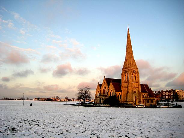 istock Snowy Church at sunset 507579440