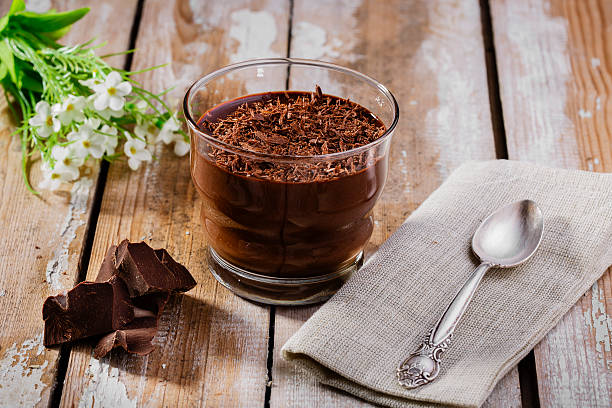 chocolate mousse in a glass chocolate mousse in a glass theobroma stock pictures, royalty-free photos & images