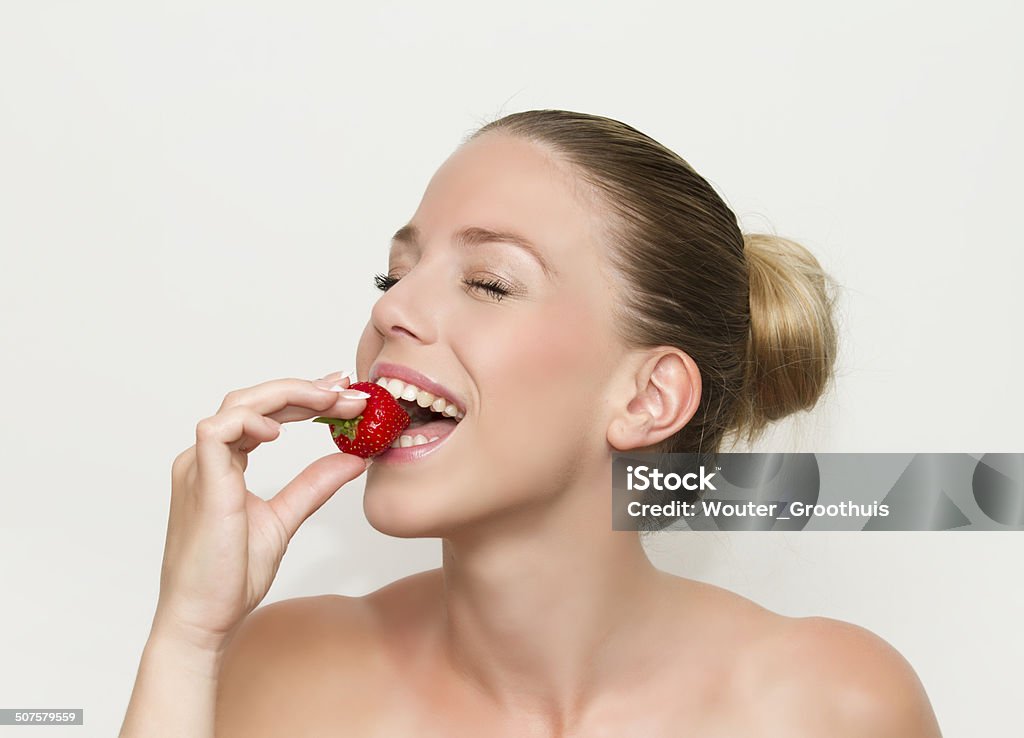 Beautiful woman with strawberry Adult Stock Photo