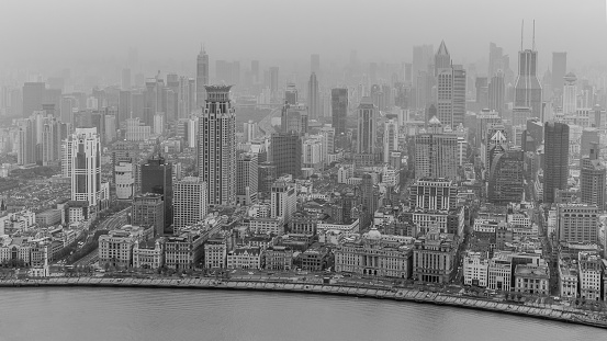 Citiyscape of Downtown Shanghai with the Huangpu River and the Bund area.