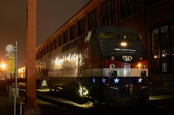 Amtrak Train No.42 Parked At Night Spencer, N.C. USA - May 30, 2014.  Amtrak Train No.42 Parked At Night During The Annual Streamliner's Festival At The N.C. Transportation Museum. Amtrak stock pictures, royalty-free photos & images