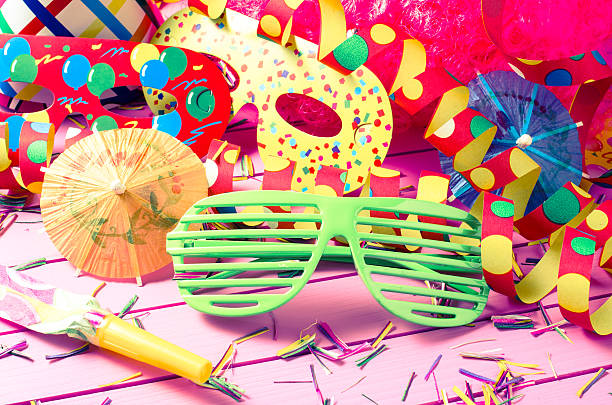 istock Colorful party decoration on pink background 507580732