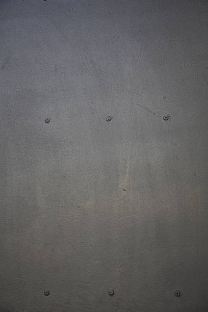 istock rivets grey iron metal background pattern aluminium steel concrete wall 507580934