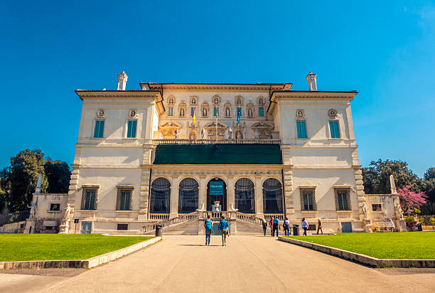 Rome, Italy - March 31, 2014: Tourists visiting the Borghese gallery in Rome on a beautiful sunny day