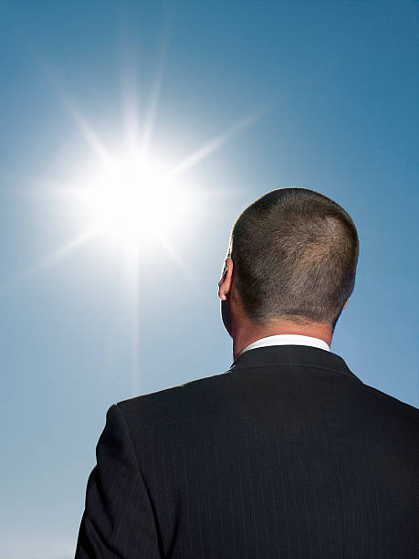 istock Businessman Looking At Sun 507581771