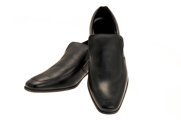 istock Mens black leather slip on shoes 507582280